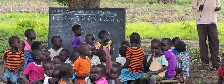 Children studying in an outdoor learning environment