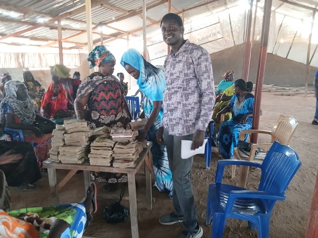 Women participating in community savings and lending activities